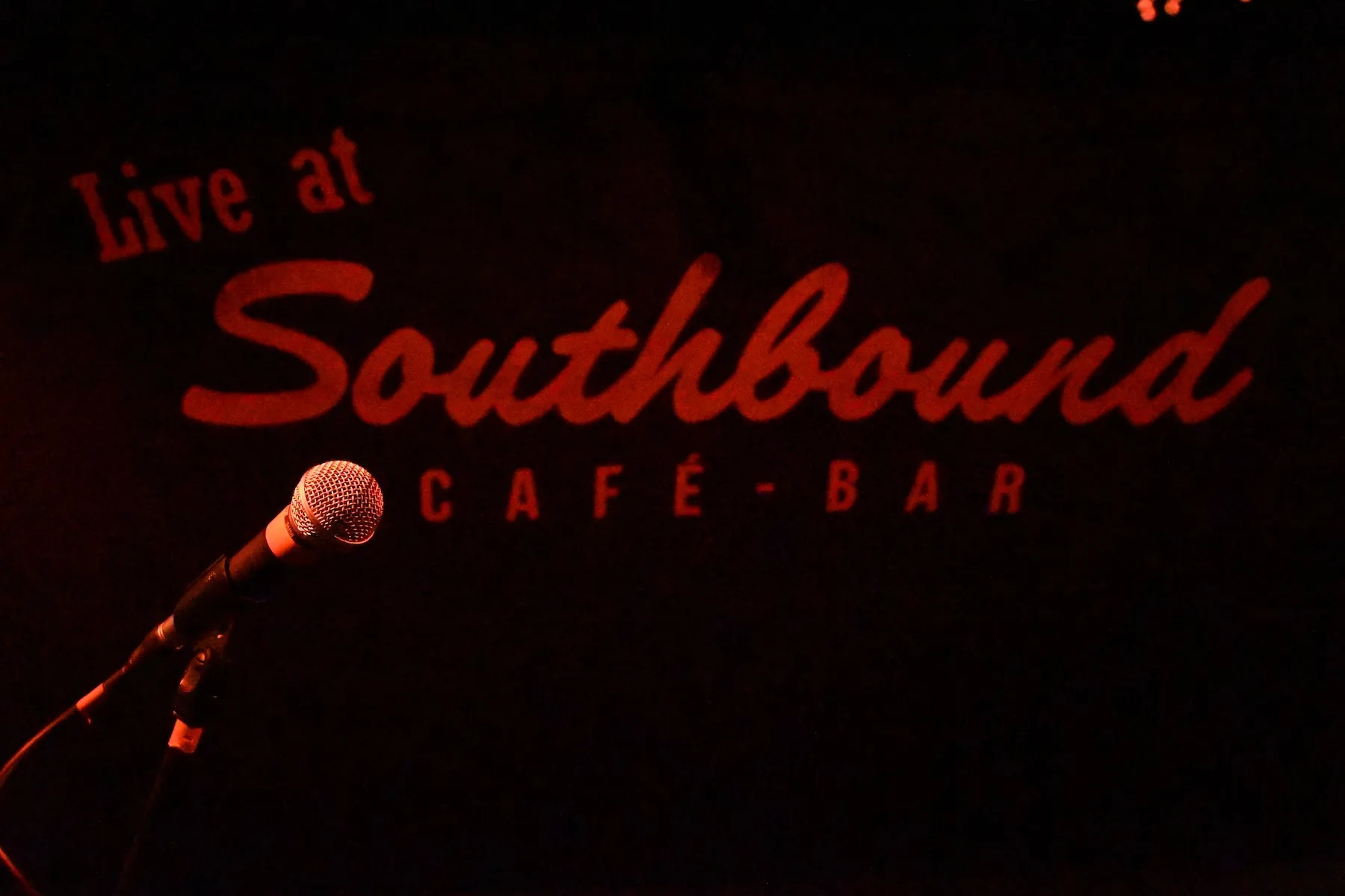 Image of the Southbound stage with a mircophone in the foreground.