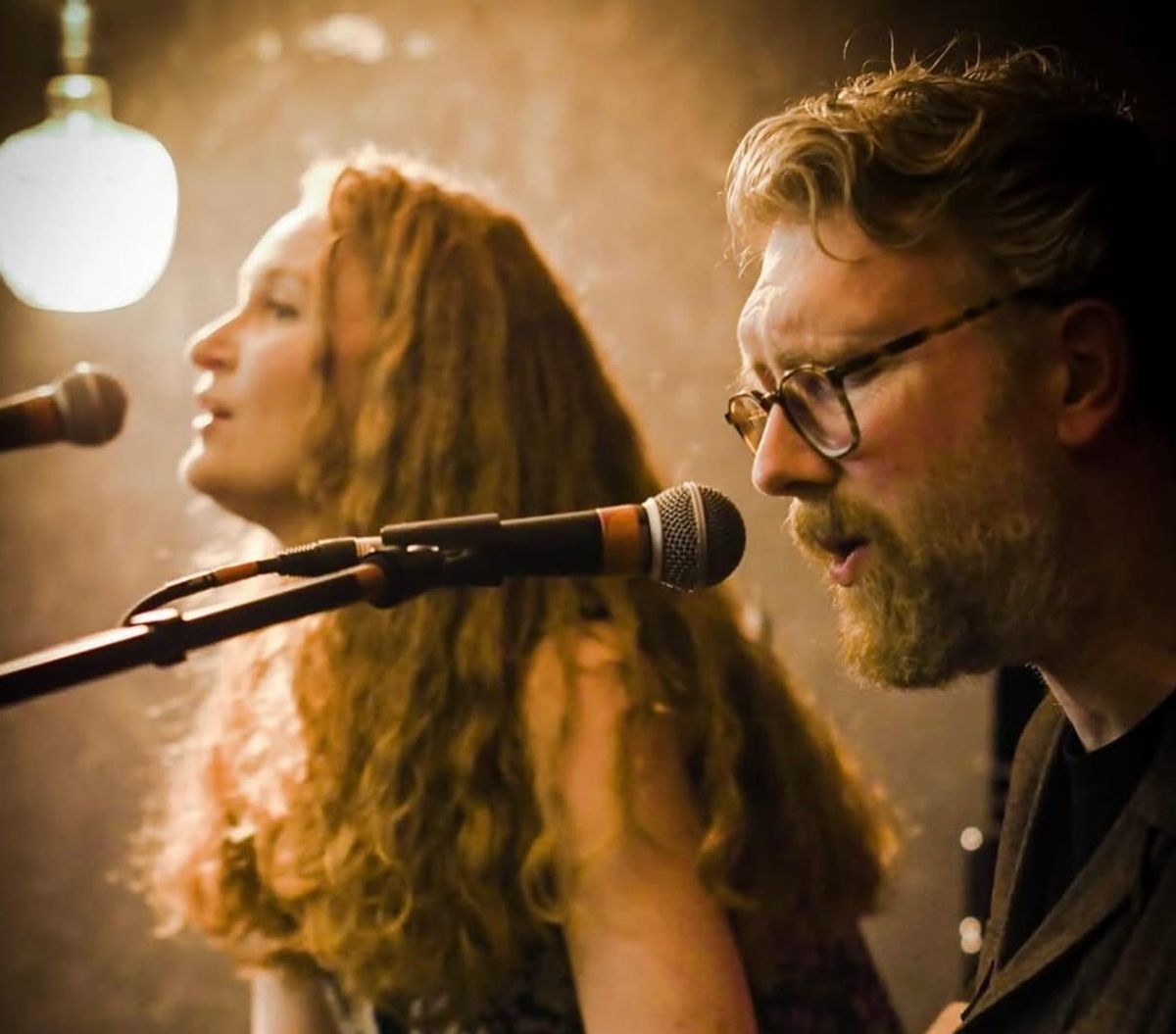 Image of the Southbound stage with a mircophone in the foreground.