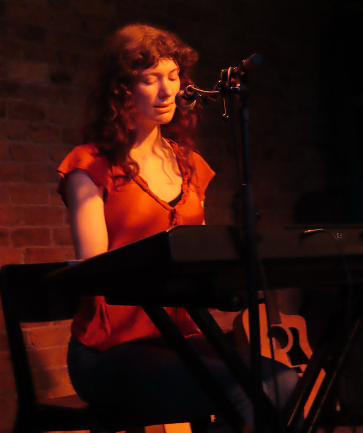 Image of the Southbound stage with a mircophone in the foreground.
